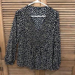 Beautiful black and tan polyester blouse!